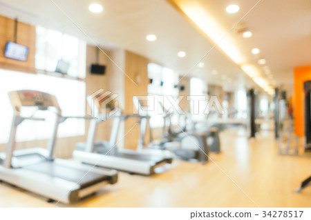 Abstract blur fitness equipment of gym interior 34278517