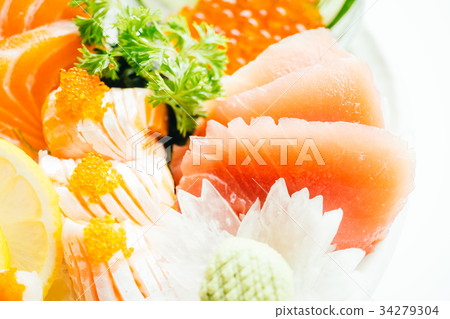 Raw and fresh mixed sashimi with salmon , tuna , hamaji and other 34279304
