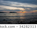Boat in the sea and sunset on sky background. 34282313