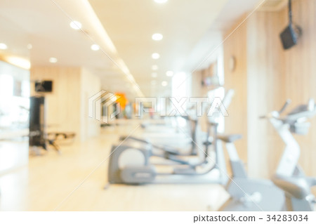 Abstract blur fitness equipment of gym interior 34283034