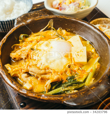 Kimchi nabe in hot plate with rice Kimchi nabe in hot plate with rice 34283796