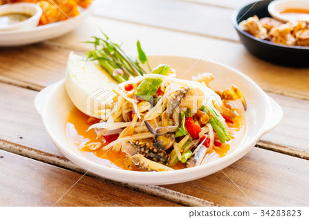 Spicy papaya salad Spicy papaya salad 34283823