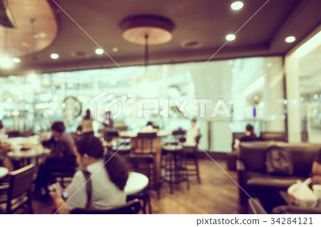 Abstract blur with bokeh and defocused cafe and restaurant Abstract blur with bokeh and defocused cafe and restaurant 34284121