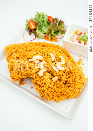 Crispy catfish salad Crispy catfish salad 34284331