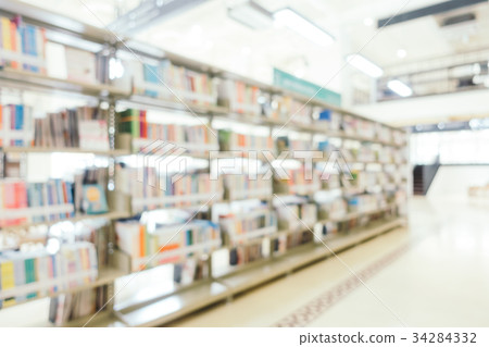 Abstract blur and defocused bookshelf in library 34284332