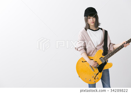 Female guitarist Female guitarist 34289822