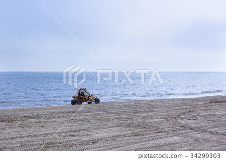 Terrain vehicle at the beach 34290303