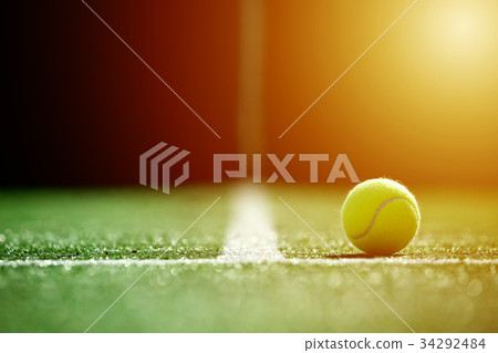 soft focus of tennis ball on tennis grass court wi 34292484