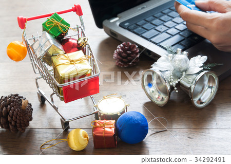 Gift boxes in shopping cart 34292491