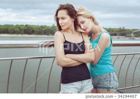 Woman offended at her friend. 34294407