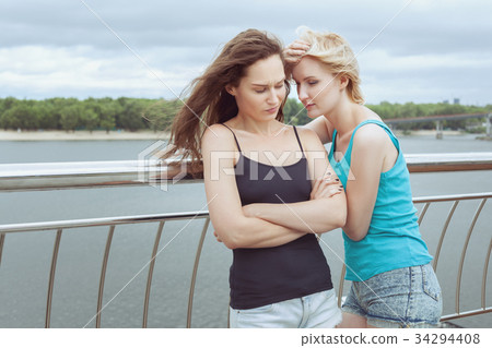Woman with a grimace of distaste. Woman with a grimace of distaste. 34294408