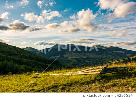 grassy hillside in mountains at sunset grassy hillside in mountains at sunset 34295554