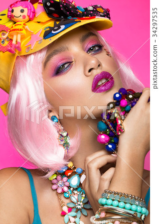 Funny comic girl with bright make-up in the style Funny comic girl with bright make-up in the style 34297535