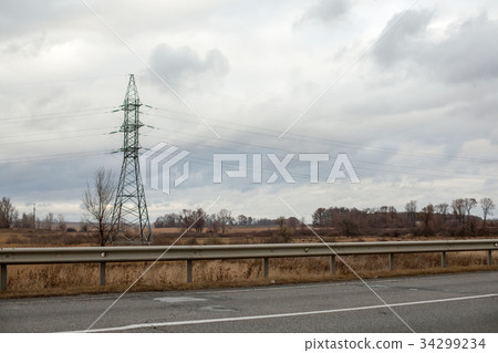 Heat haze rises as powerlines Heat haze rises as powerlines 34299234
