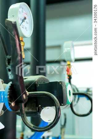 Closeup of manometer in a boiler room Closeup of manometer in a boiler room 34300176