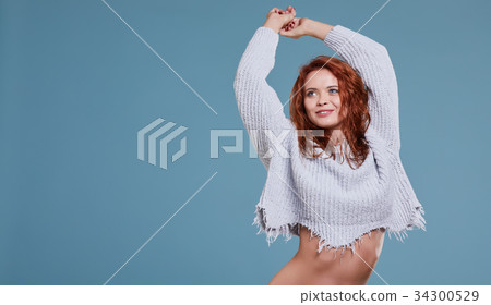 young redhead woman in autumn color isolated on fall background young redhead woman in autumn color isolated on fall background 34300529