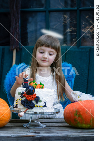 Angel and birthday cake 34300562