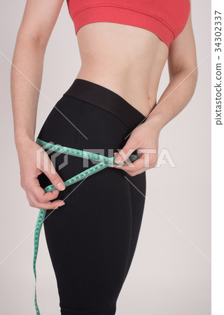 Fit girl takes her butt and hips with a Fit girl takes her butt and hips with a 34302337