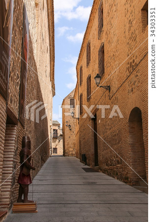 Empty old street in Toledo, Spain Empty old street in Toledo, Spain 34303351