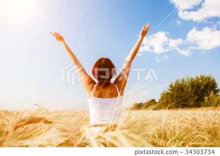 Photo from back of girl in field 34303734