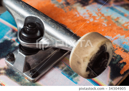 Skateboard truck with chassis close up 34304905