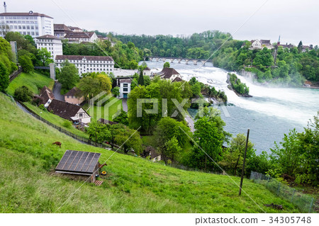 Rheinfall with goats house on hill in Schaffhausen 34305748