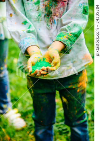Colorful holi painted hands Colorful holi painted hands 34305884
