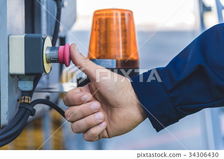 Man finger pushing rubber knob Man finger pushing rubber knob 34306430