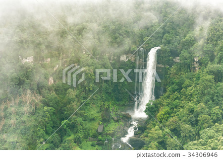 Tad Tiger waterfall in  forest at Bolaven highland 34306946