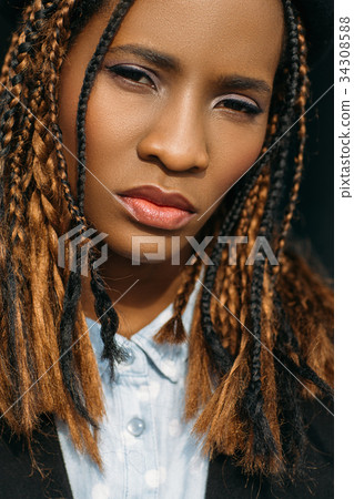 Young female fashion portrait. Pretty black woman 34308588