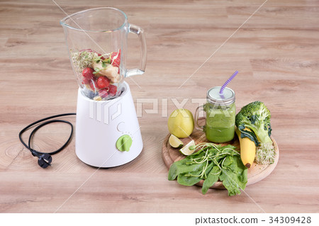 Mason jar of dietary drink with broccoli, spinach Mason jar of dietary drink with broccoli, spinach 34309428