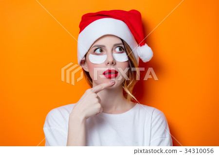Woman using eye patch for her eyes 34310056