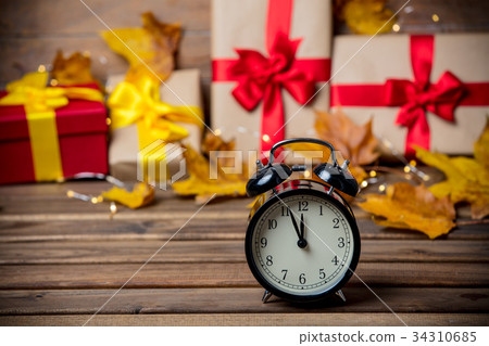 alarm clock with leaves and pumpkin alarm clock with leaves and pumpkin 34310685