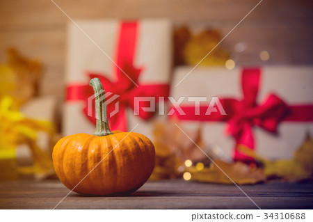 leaves and pumpkin with Halloween gift box leaves and pumpkin with Halloween gift box 34310688