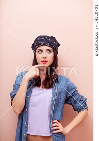 Young redhead girl in bandana Young redhead girl in bandana 34310701