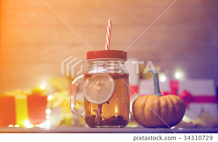 leaves and pumpkin with Halloween gift box and Tea leaves and pumpkin with Halloween gift box and Tea 34310729