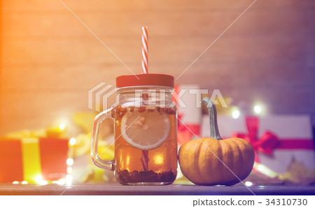 leaves and pumpkin with Halloween gift box and Tea leaves and pumpkin with Halloween gift box and Tea 34310730