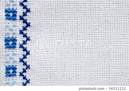 Embroidery texture. Cross stitch. 34311122