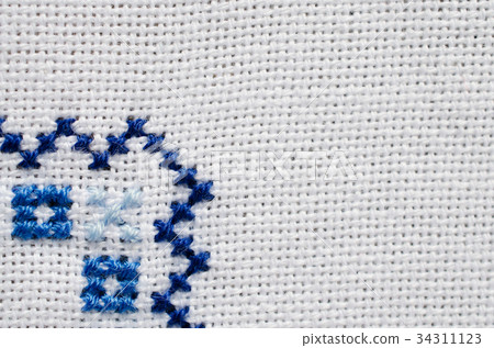 Embroidered fragment on white flax. 34311123