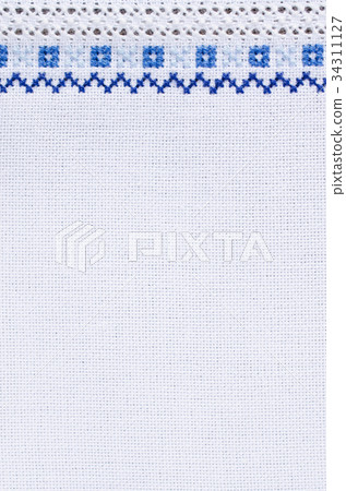 Design of ethnic pattern. Embroidery texture. Design of ethnic pattern. Embroidery texture. 34311127