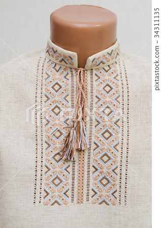 Slavic tradicional embroidered shirt. 34311135
