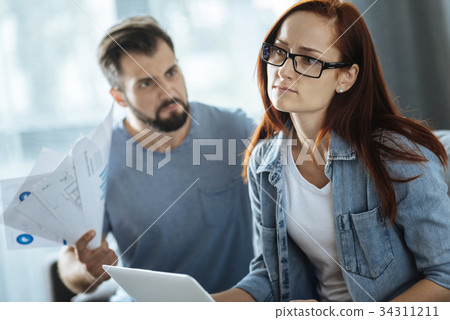 Smart unhappy woman feeling guilty 34311211