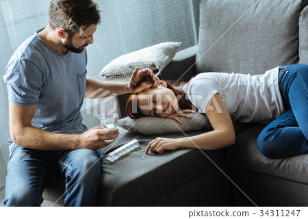 Nice loving man holding a glass of water Nice loving man holding a glass of water 34311247