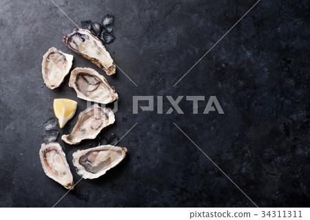 Oysters and lemon Oysters and lemon 34311311
