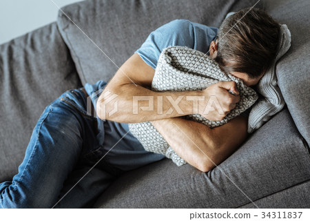 Unhappy sad man crying Unhappy sad man crying 34311837