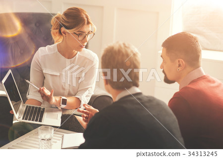 Beautiful professional businesswoman sitting Beautiful professional businesswoman sitting 34313245