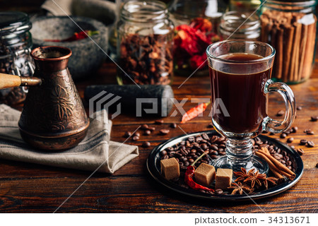 Cezve and Cup of Coffee with Oriental Spices. Cezve and Cup of Coffee with Oriental Spices. 34313671