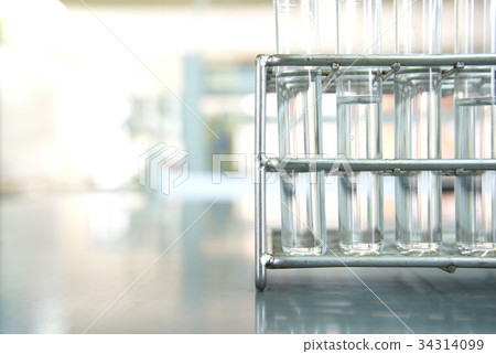 test tube metal rack in science lab background 34314099