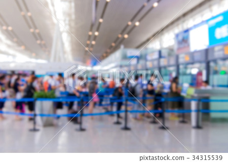 blurred of Traveler Check in at airport terminal blurred of Traveler Check in at airport terminal 34315539