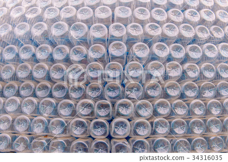 Stack of bottom plastic bottles texture Stack of bottom plastic bottles texture 34316035